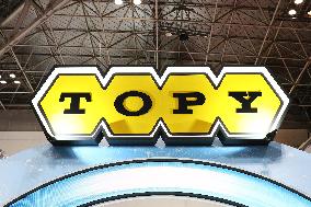 Topy Industries signage and logo